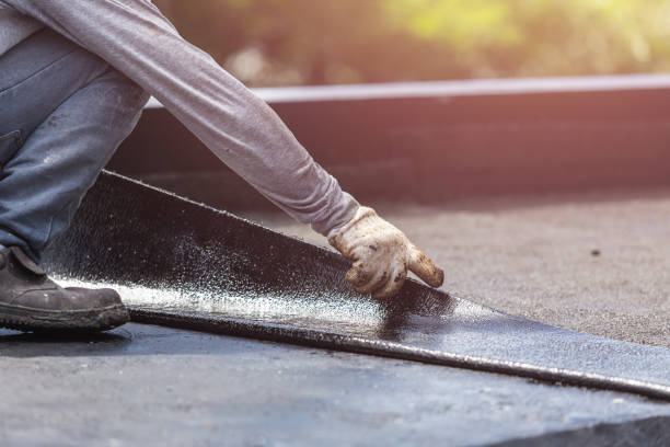 Professional Basement Waterproofing technician working in Perry Park, KY